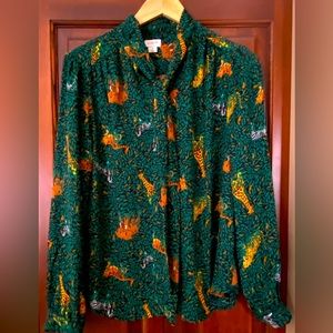 Never worn, pretty shirt. Gorgeous animal print. Delicate and feminine. Size M.